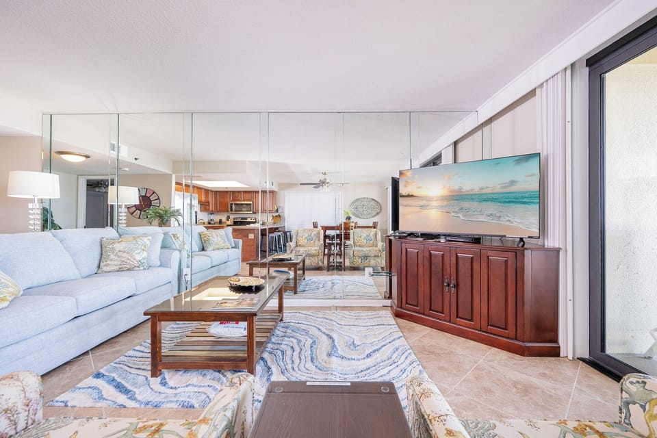 Unwind on plush seating, savoring coastal views and the gentle rhythm of the shore while enjoying family time