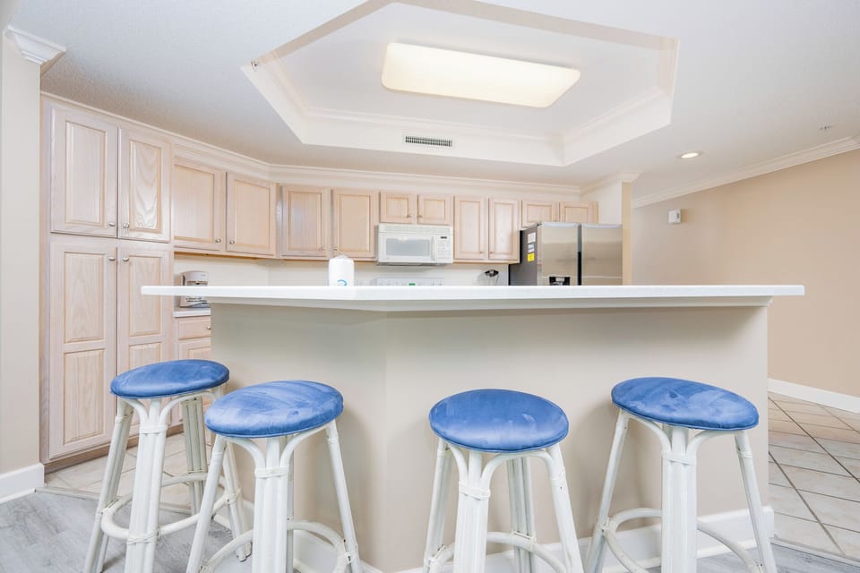 Sip your morning coffee at the breakfast bar and get ready for a day of adventure in this stylish space