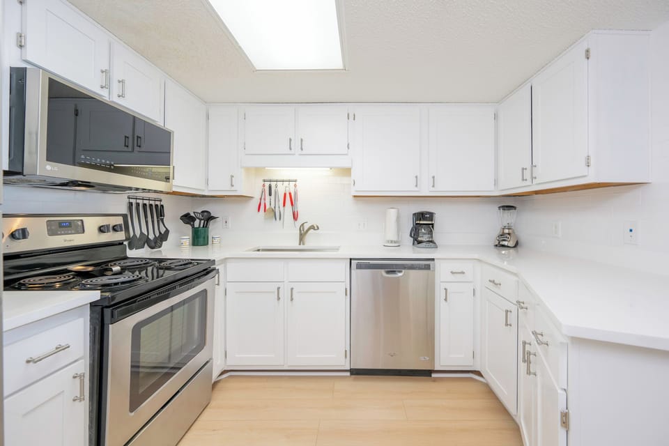 Prepare delicious family meals in this inviting kitchen with stainless appliances