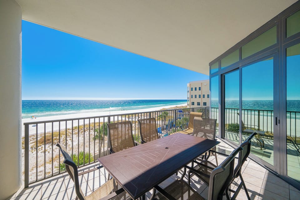 Savor the beach vibe while lounging on your balcony, taking in the refreshing coastal views and breezy sounds