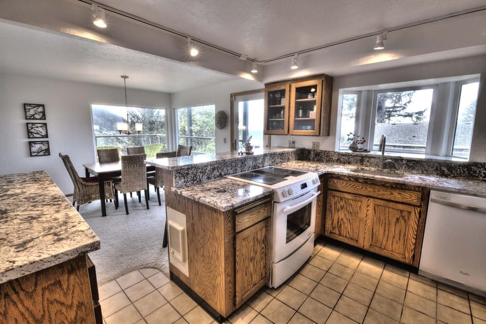 Open floor plan accents a craftsman inspired kitchen.