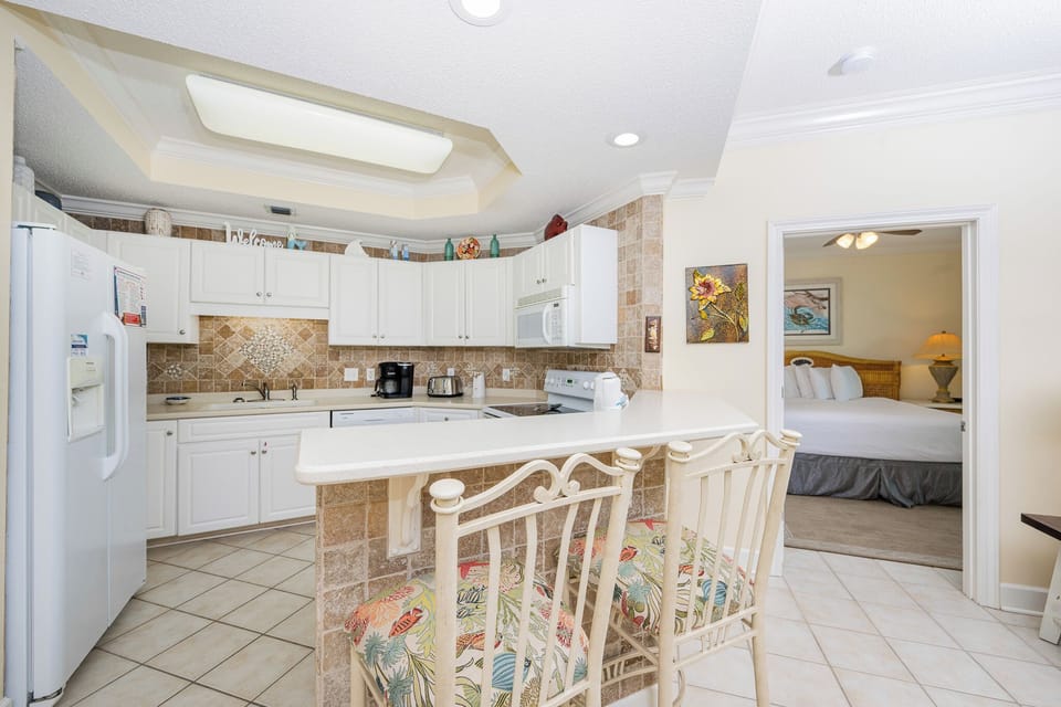 Sip your morning coffee at the breakfast bar and get ready for a day of adventure in this stylish space
