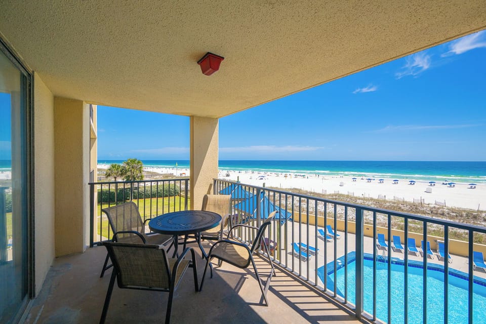 Your balcony invites you to savor the warm gulf breeze while watching the pool and beach below