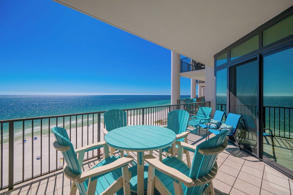 Relax in vibrant seating while soaking up the coastal views and fresh breezes from your balcony