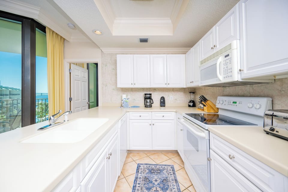 Create delicious meals or enjoy a cup of coffee in this inviting kitchen, designed for comfort and ease