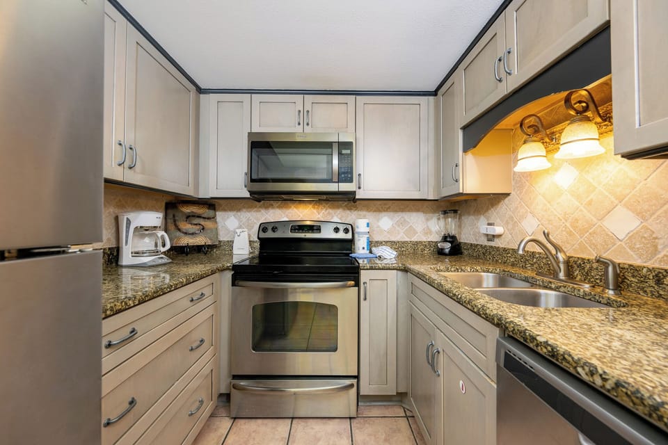 Create family favorites in the inviting kitchen, featuring seamless counter space and stainless appliances