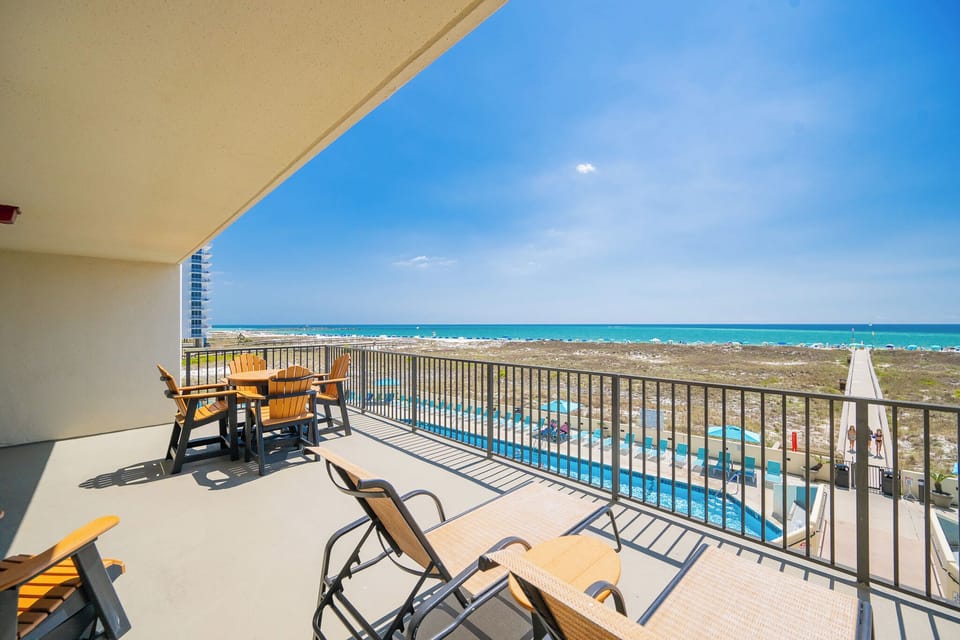 Relax on your extended balcony, taking in soothing coastal views and enjoying the refreshing beach vibe with loved ones