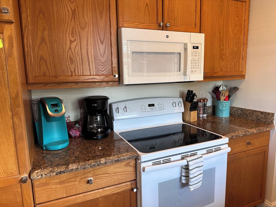 Kuerig and drip coffee pots. 