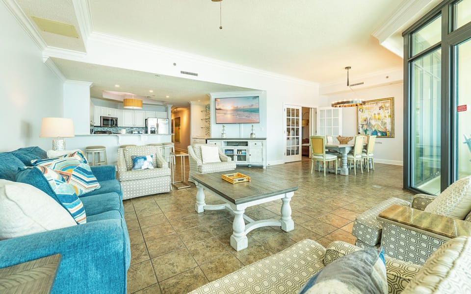 Unwind in the cozy living area, with a queen sofa sleeper, feeling the beach vibe as you stream your favorite shows
