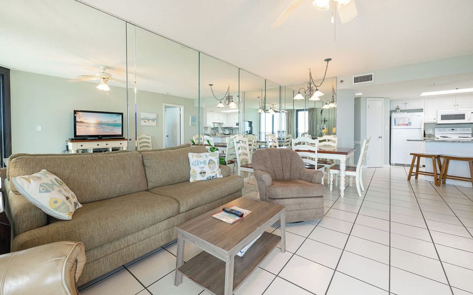 Sink into the plush sofa with a queen sleeper while enjoying a family movie night, surrounded by delightful beach vibes