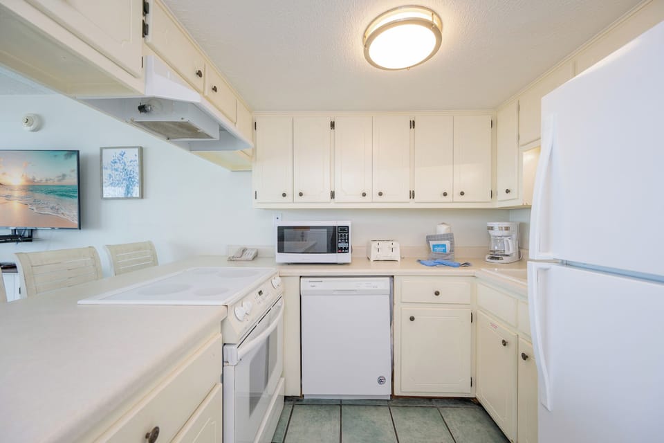 Prepare tasty snacks and meals as you gather with family in this welcoming kitchen space, enjoying every moment