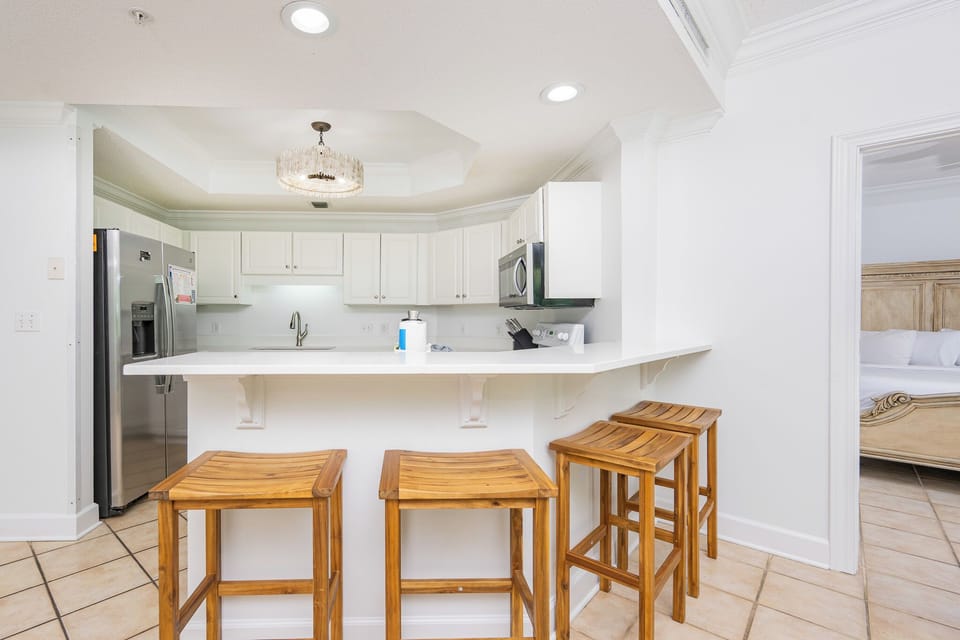 Sip your morning coffee at the breakfast bar and get ready for a day of adventure in this stylish space