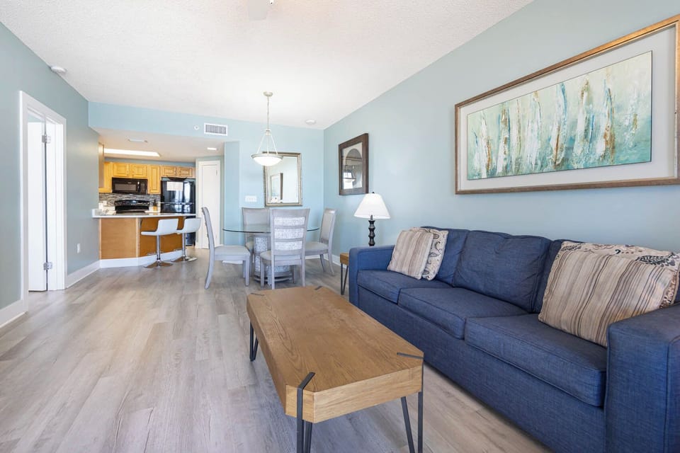 Relax on the comfortable sofa with queen sleeper while enjoying the stylish decor and open layout that invites conversation