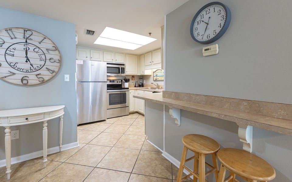 Whip up your favorite dishes in a cozy kitchen, where the warm vibe invites family gatherings and fun conversations