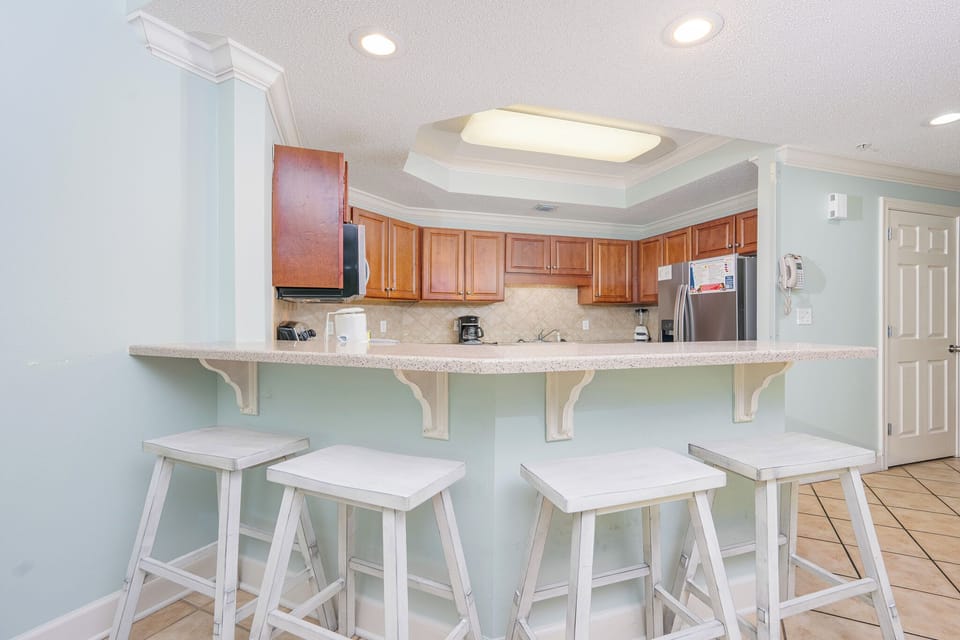 Sip your morning coffee at the breakfast bar and get ready for a day of adventure in this stylish space