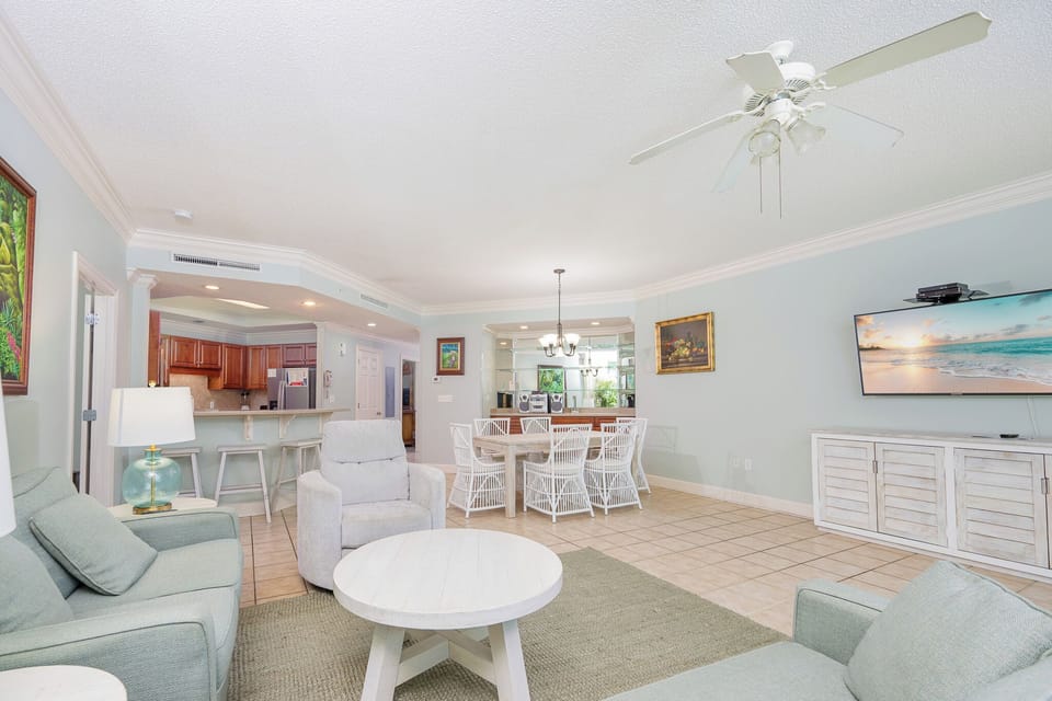 Unwind in this inviting family room with cozy seating and enjoy a movie or stream your favorite shows