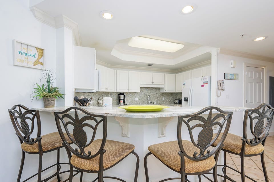 Sip your morning coffee at the breakfast bar and get ready for a day of adventure in this stylish space