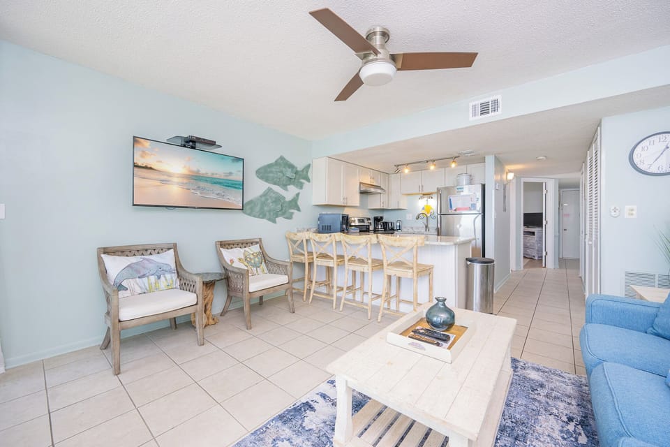 Unwind on the comfortable chairs, enjoying engaging conversations while taking in the coastal vibe around you