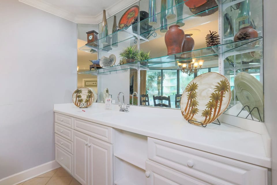 Grab a chilled drink from the fridge or create your favorite cocktail at the wet bar