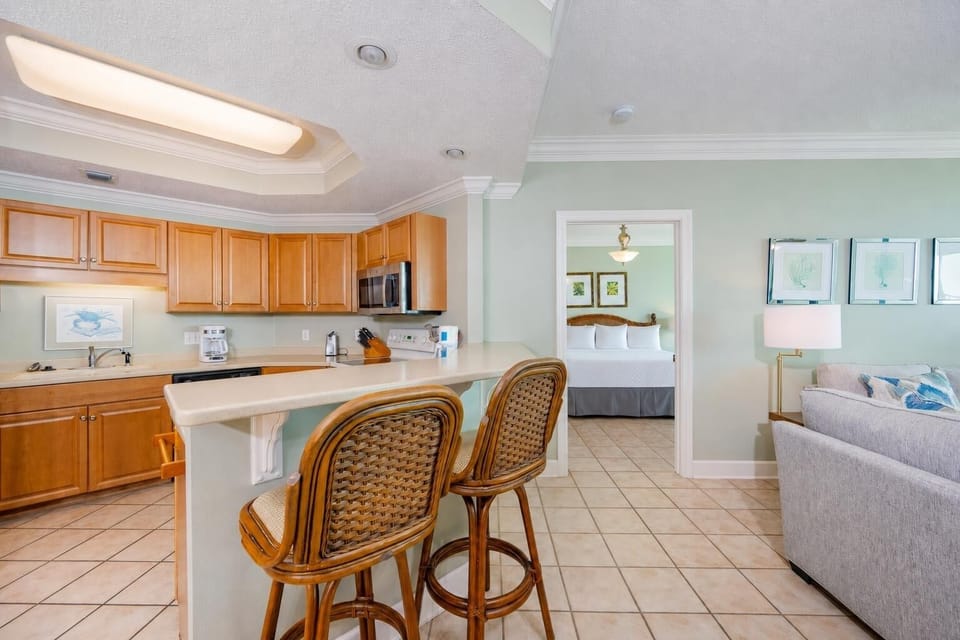 Sip your morning coffee at the breakfast bar and get ready for a day of adventure in this stylish space