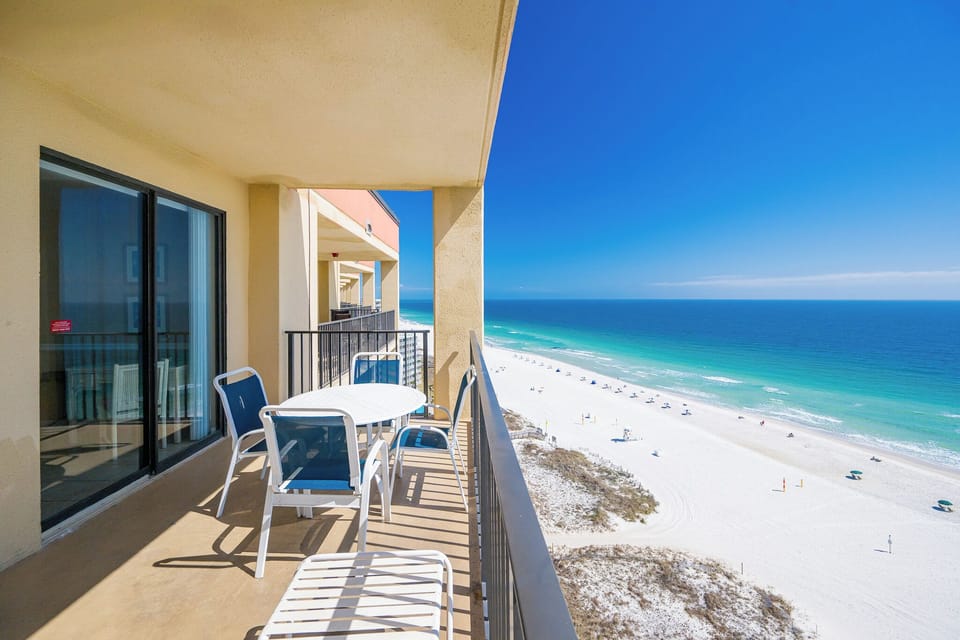 Gentle gulf breezes welcome you to your balcony where you sip drinks and watch the shore unwind below