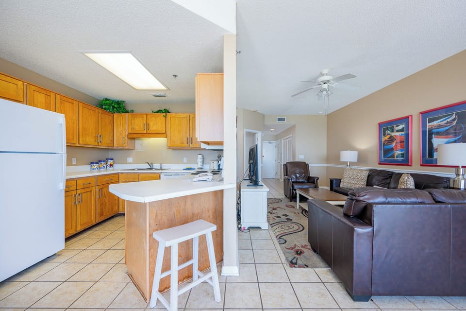Bright kitchen light energizes your morning as you prepare fresh coffee before settling into the living room