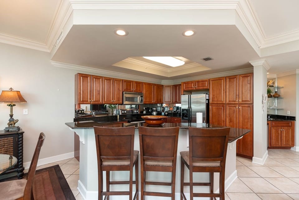 Sip your morning coffee at the breakfast bar and get ready for a day of adventure in this stylish space