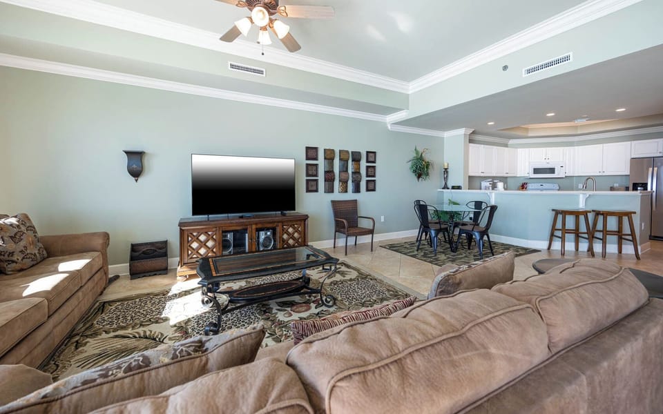 Immerse yourself in leisure as you curl up on the plush couch, enjoying movie nights with loved ones