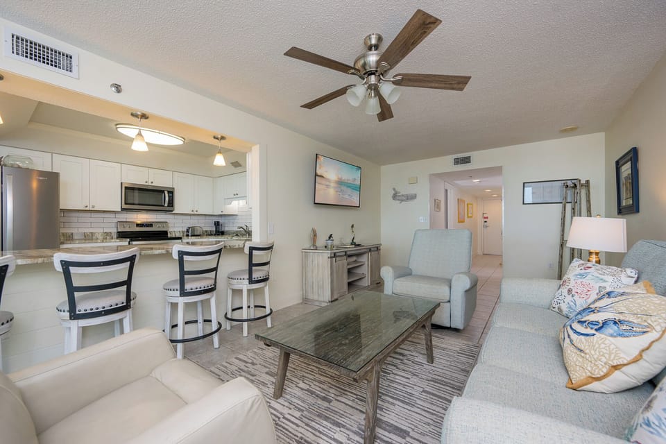 Relax in the comfy seating as you enjoy laughs, shared stories, and the inviting vibe of your beach getaway