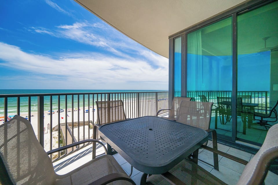 Sip your morning coffee at the outdoor table, enjoying the expansive views of the tranquil shoreline
