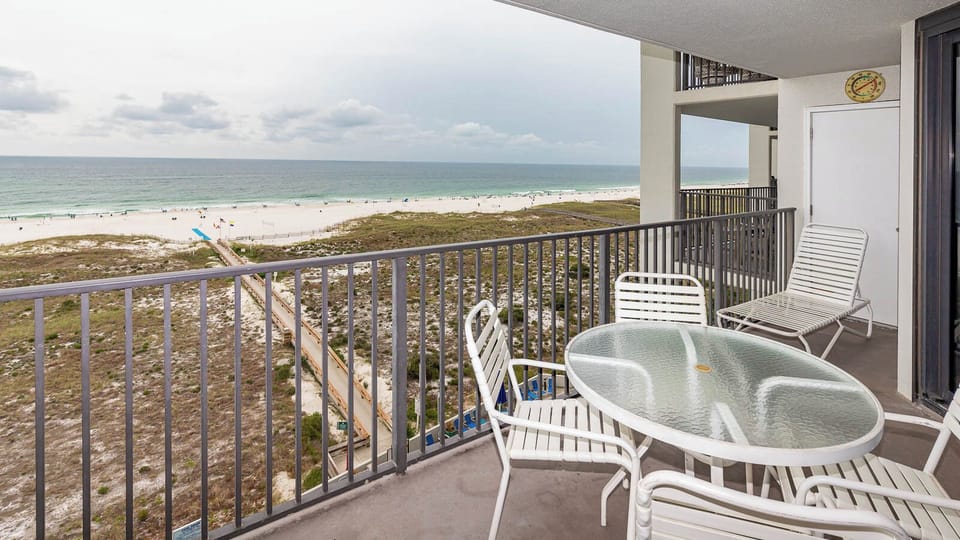 Relaxing spot to enjoy views of the beach and gulf, with a pathway leading directly to the shore