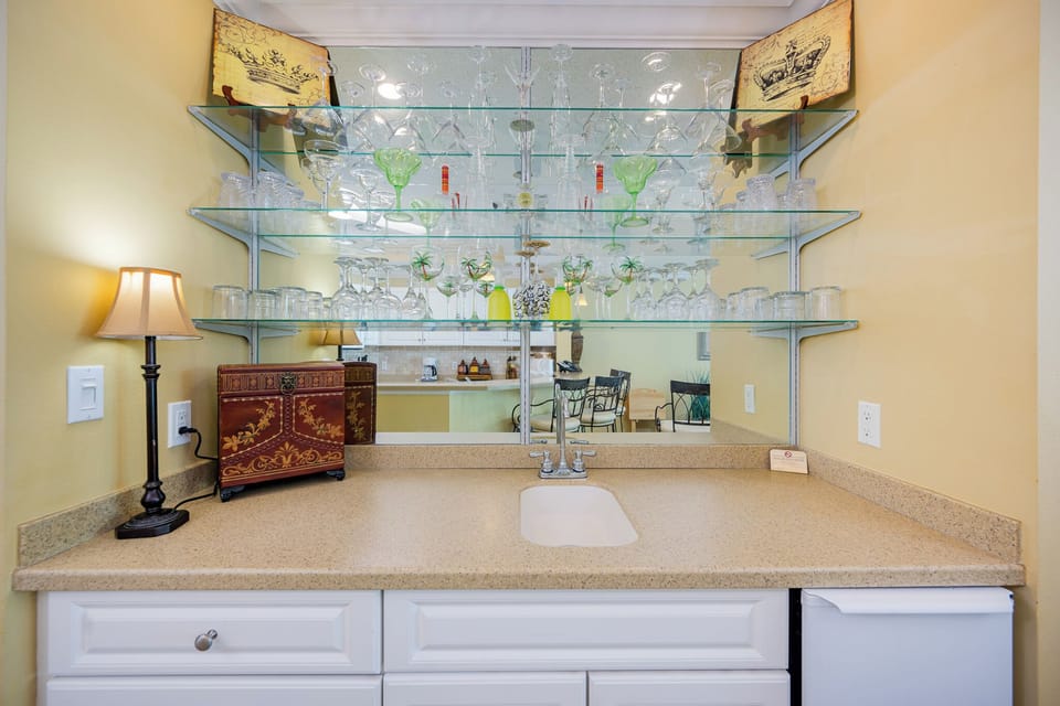 Mix your favorite drinks at the inviting wet bar, adding flair to your relaxation while gathering with loved ones