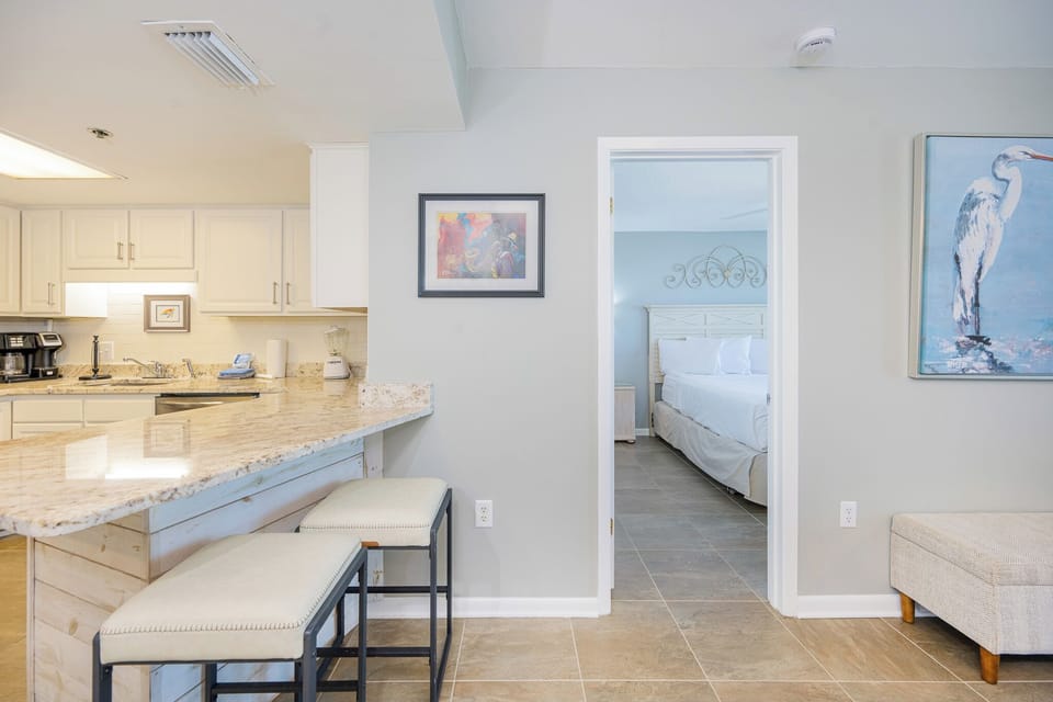 Cook and gather at the spacious kitchen with granite countertops and a breakfast bar