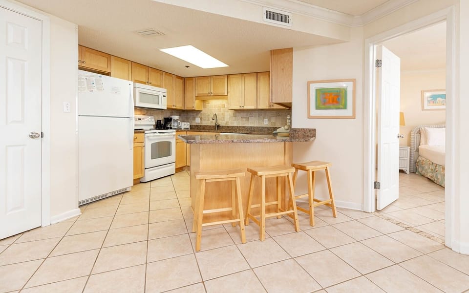 Cook meals in the bright kitchen with ample counter space and enjoy casual dining at the breakfast bar