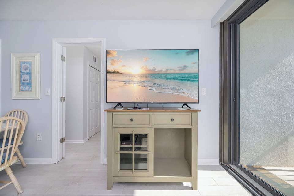 Stream your favorite shows on the TV while gathered in the cozy living area, creating lasting family memories