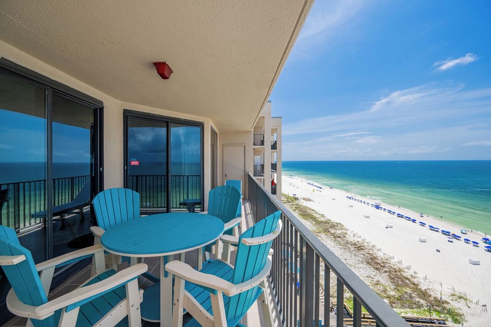 Take in the expansive views of the beach and vibrant waters from your cozy seating