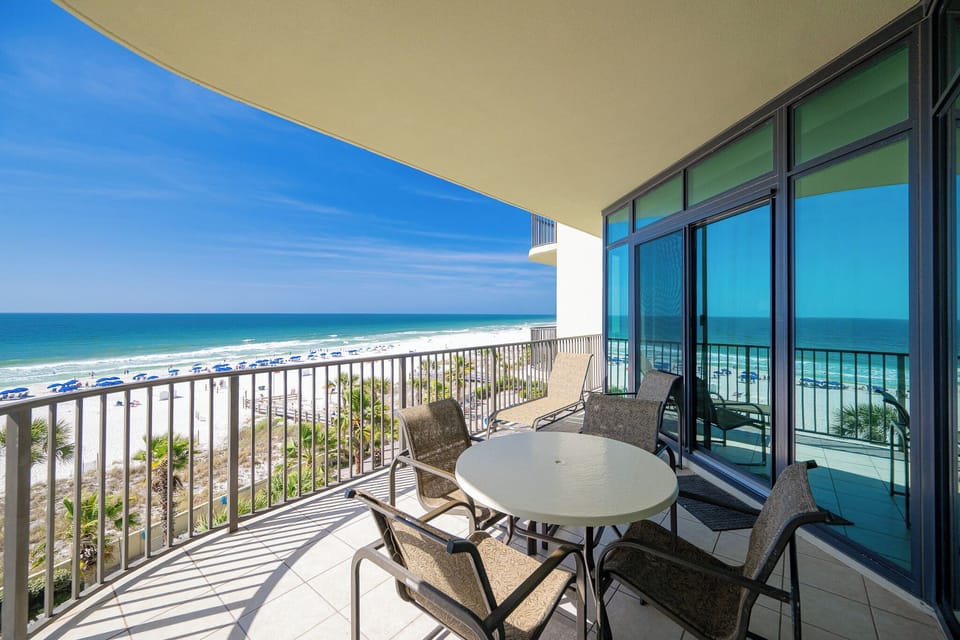 Your balcony invites you to unwind with gentle gulf breezes and the soothing sound of waves nearby