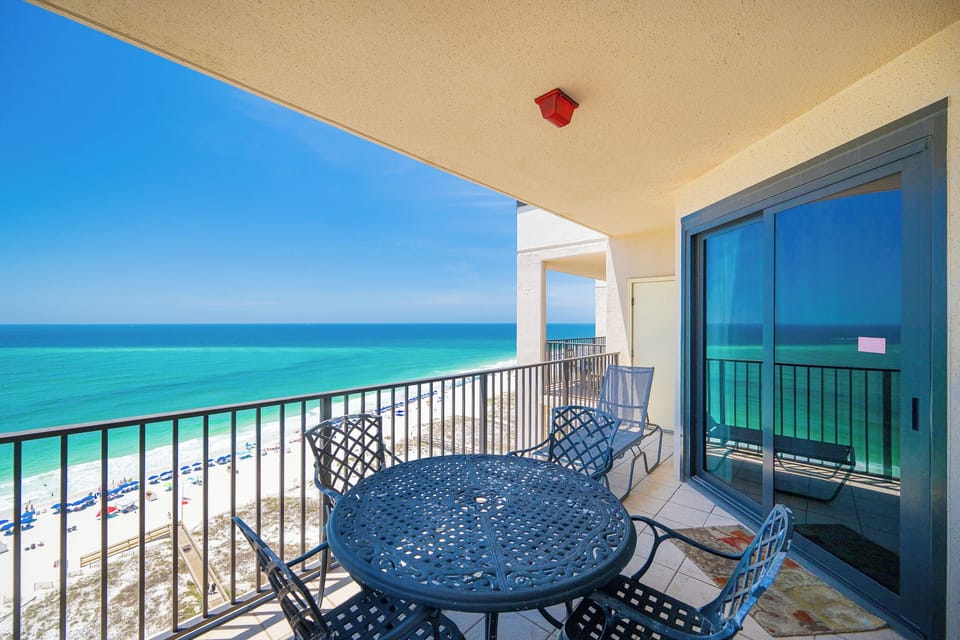 Enjoy meals or drinks on the balcony while taking in the expansive views of the shoreline and water