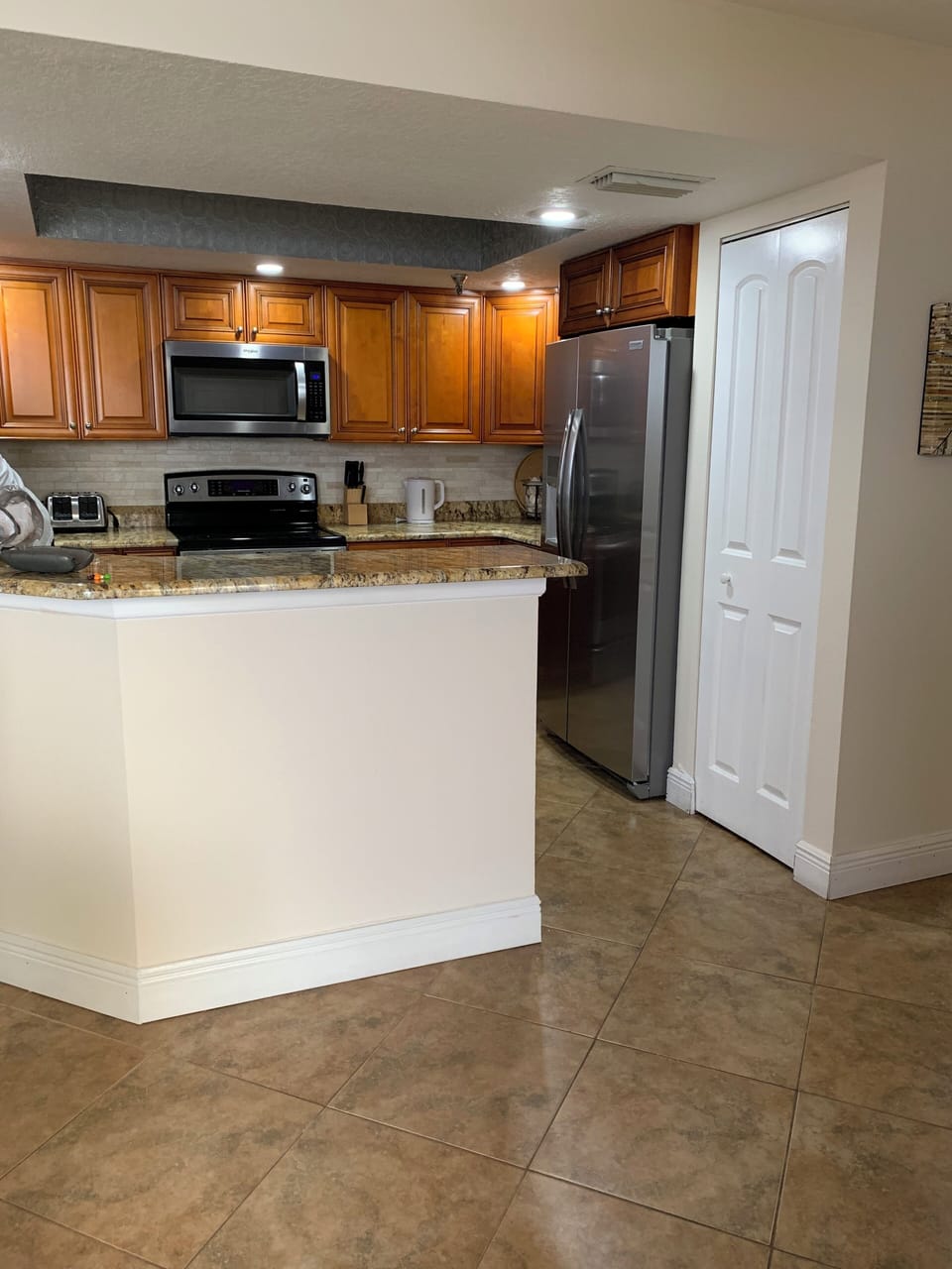 Awesome kitchen with newer appliances and pantry area. 