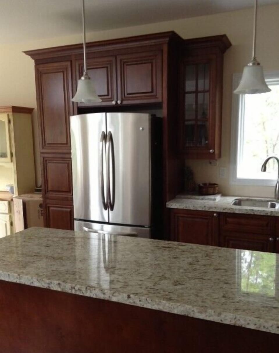 Stainless steel appliances including oversize fridge
