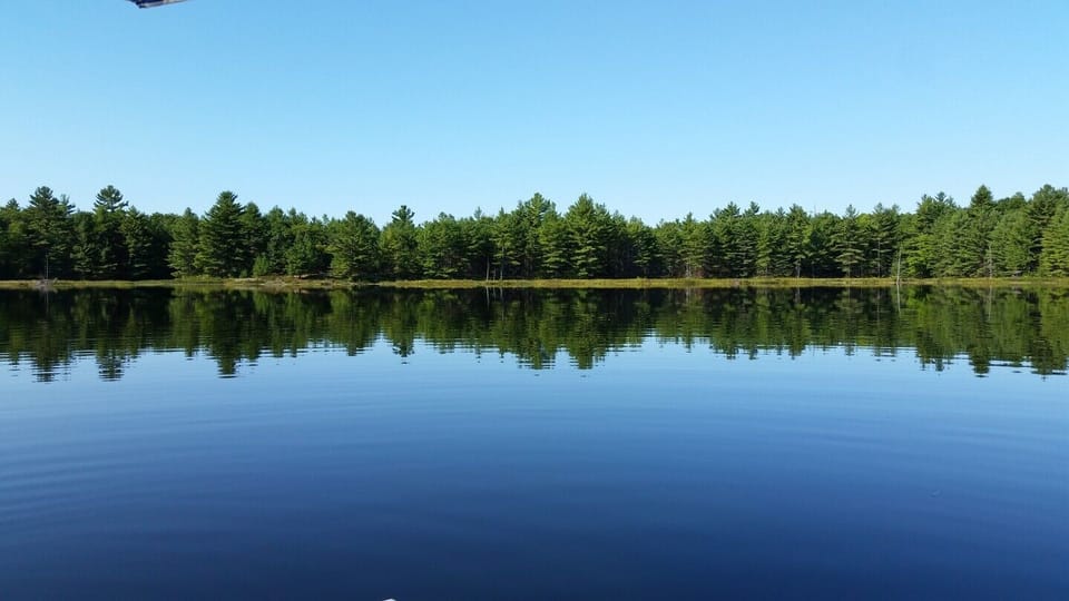 In the morning, the lake is often still and the water is a mirror.