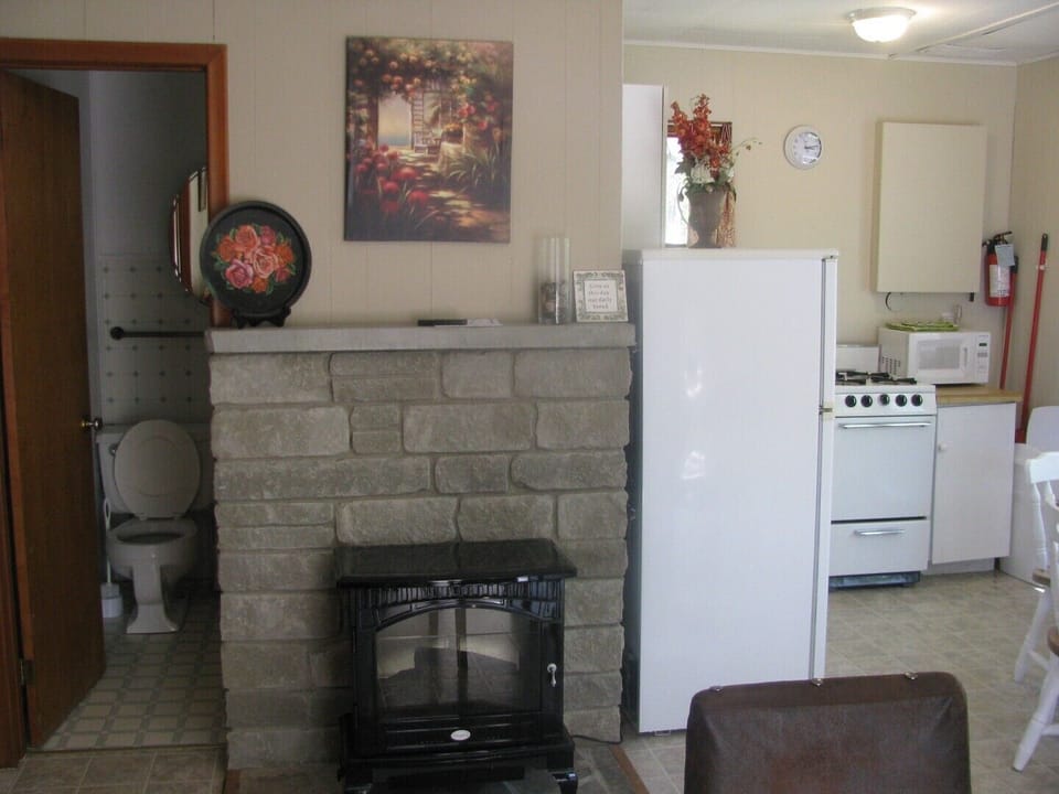 A stone hearth with an electric fireplace