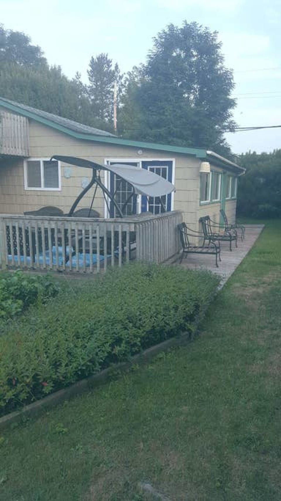 Two store deck and a deck across the front of the cottage.