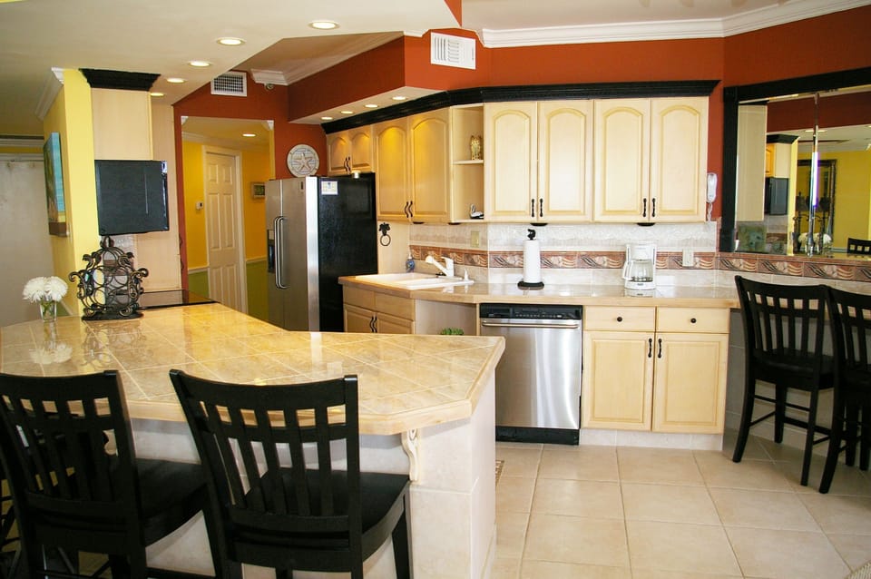 Large kitchen all new top of the line stainless steel appliance. Balcony access
