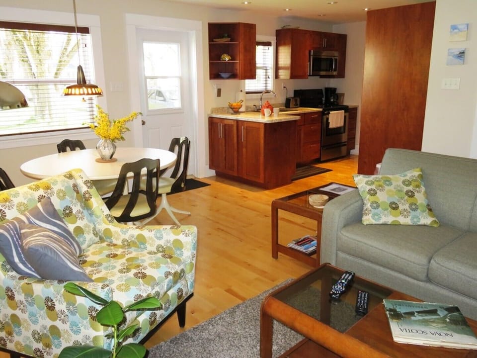 Open concept living room, dining room and kitchen area
