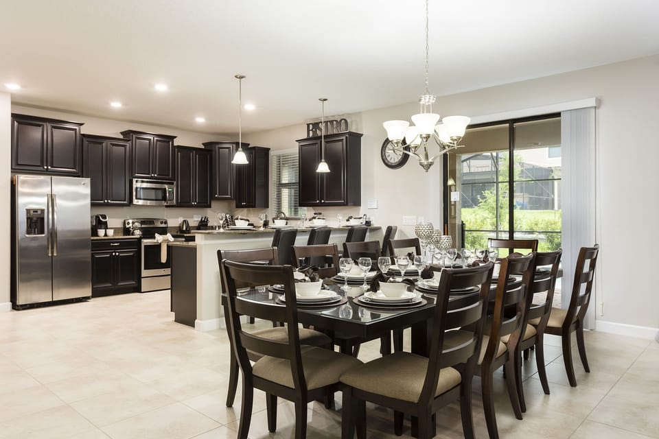 The open kitchen and dining area is great for spending time together on vacation