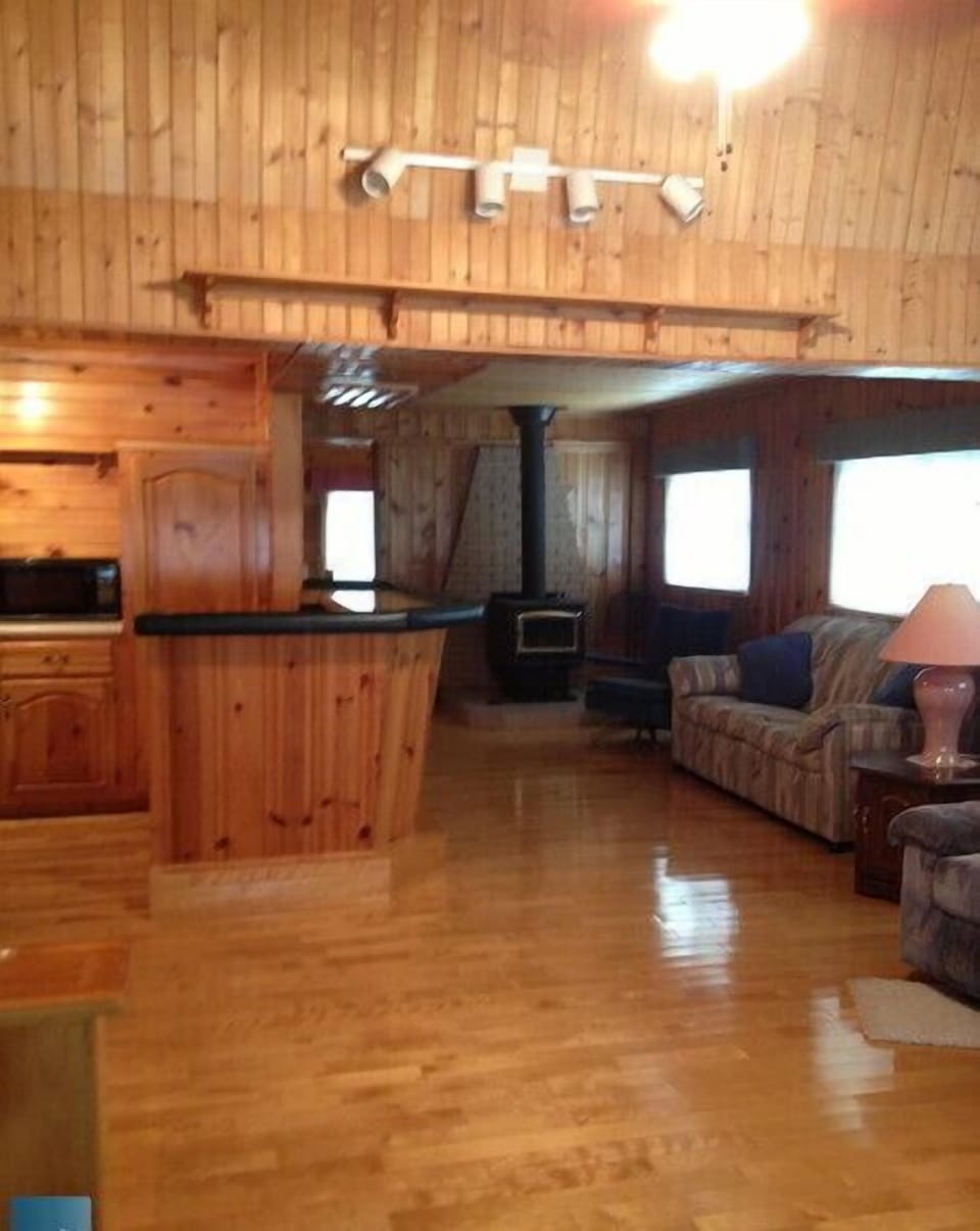 Family room with bar area and fireplace