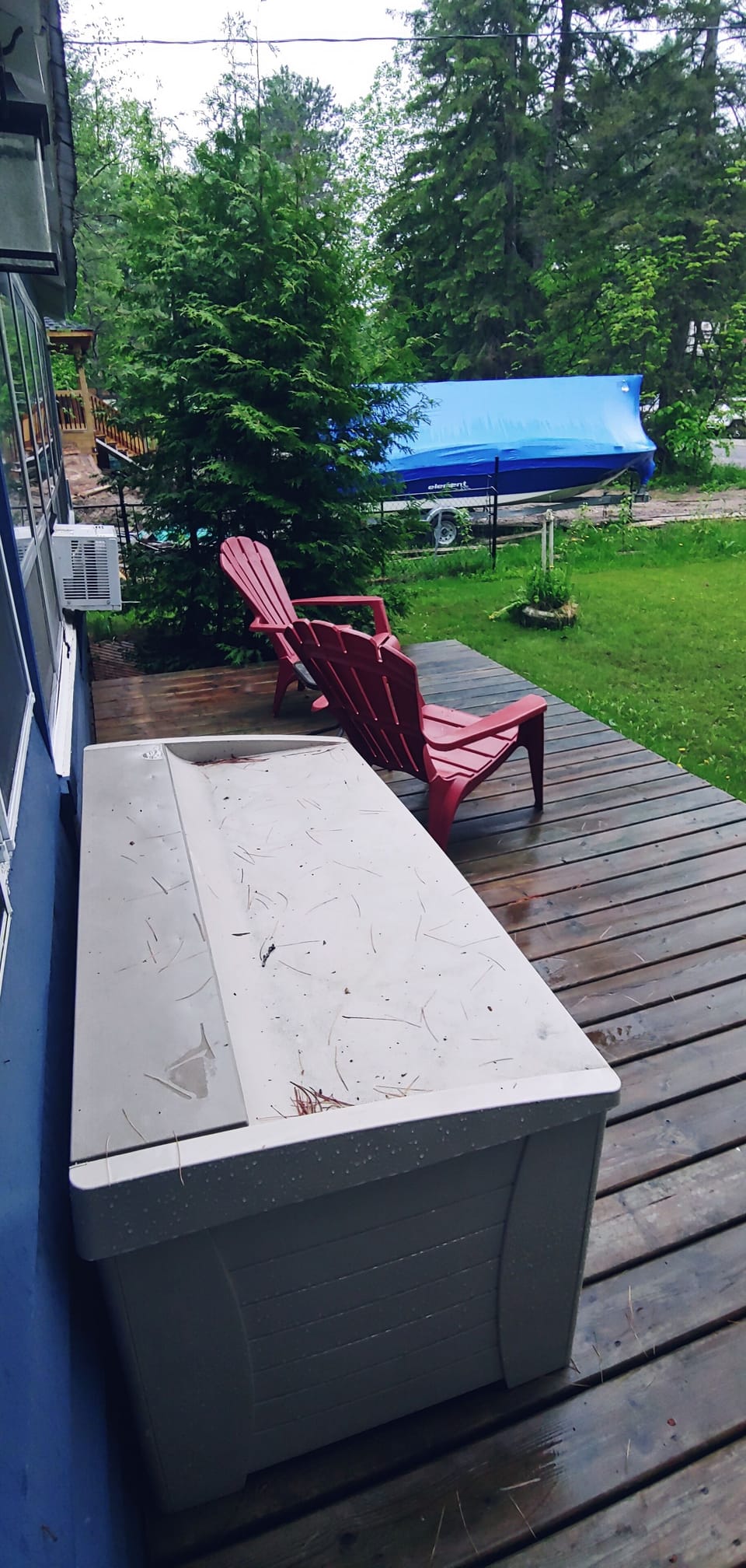 Front Deck with 2 Muskoka Chairs & drink table , outdoor / beach toy(s) bin