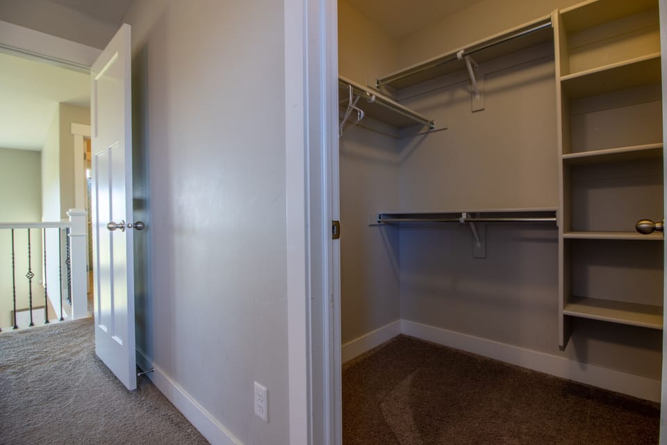 Upstairs bedroom 1 walk-in closet