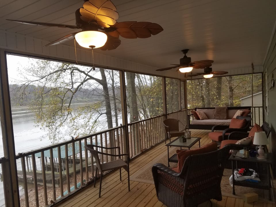 The screened in, mosquito proof porch, has beautiful views of the water and various wildlife, including a local family of bald eagles.

There is also a bed swing that provides relaxing afternoon naps.

Morning sunrise and evening sunset are awesome.